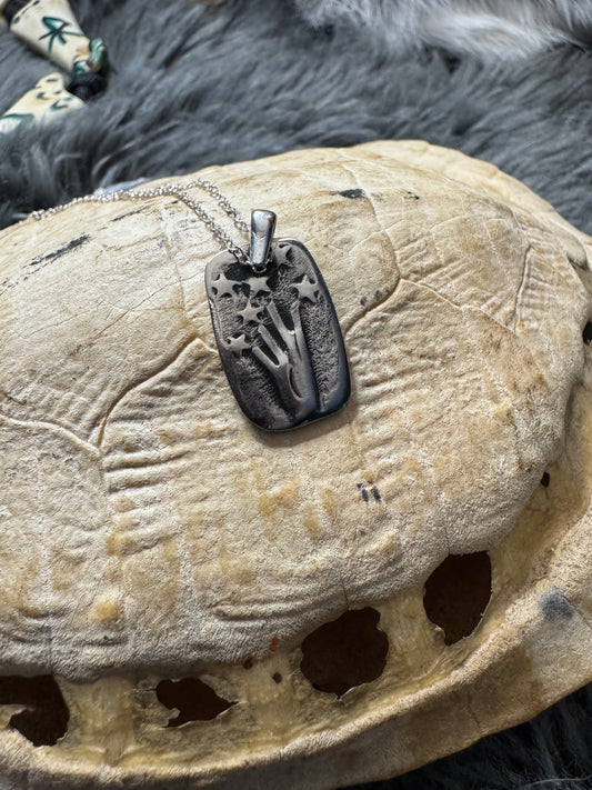 Grabbing Stars Pendant